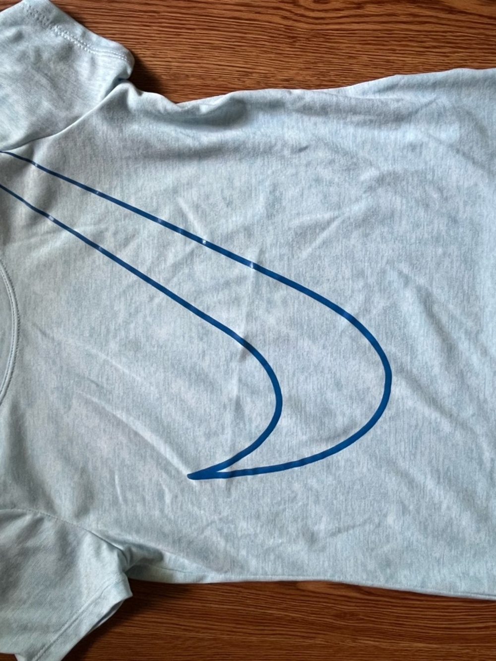 Nike Light Blue Tee with Blue Swoosh Graphic